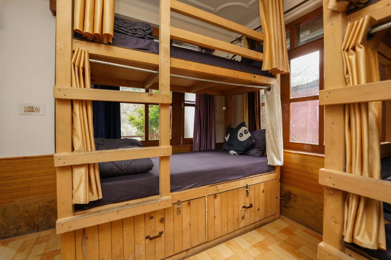 Bunk bed detail with curtain, made up