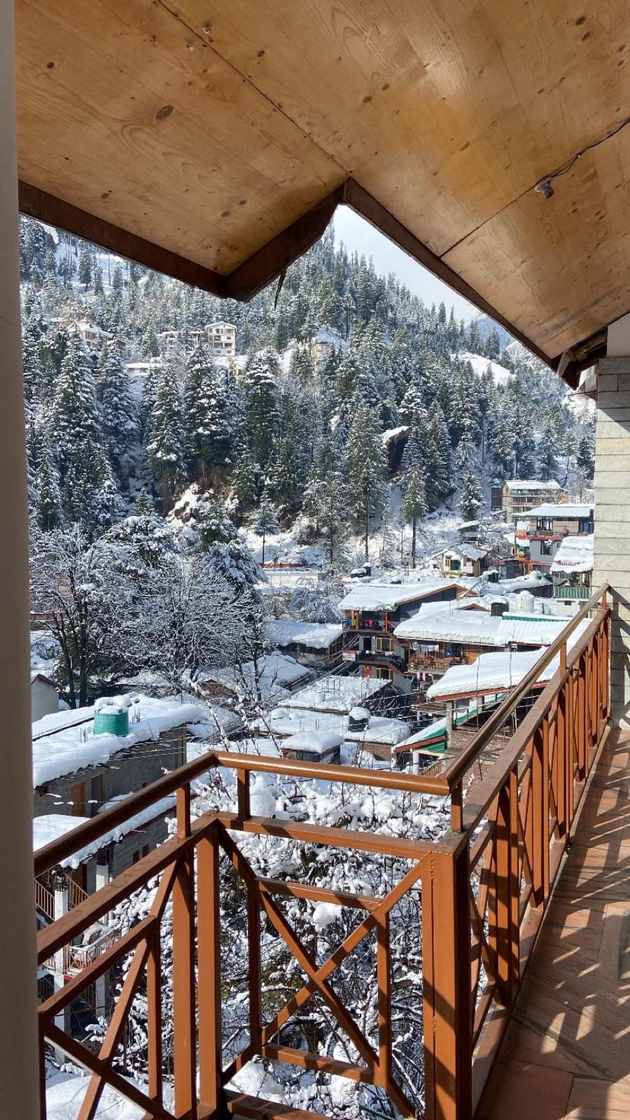 Snow-covered mountain village view from the property